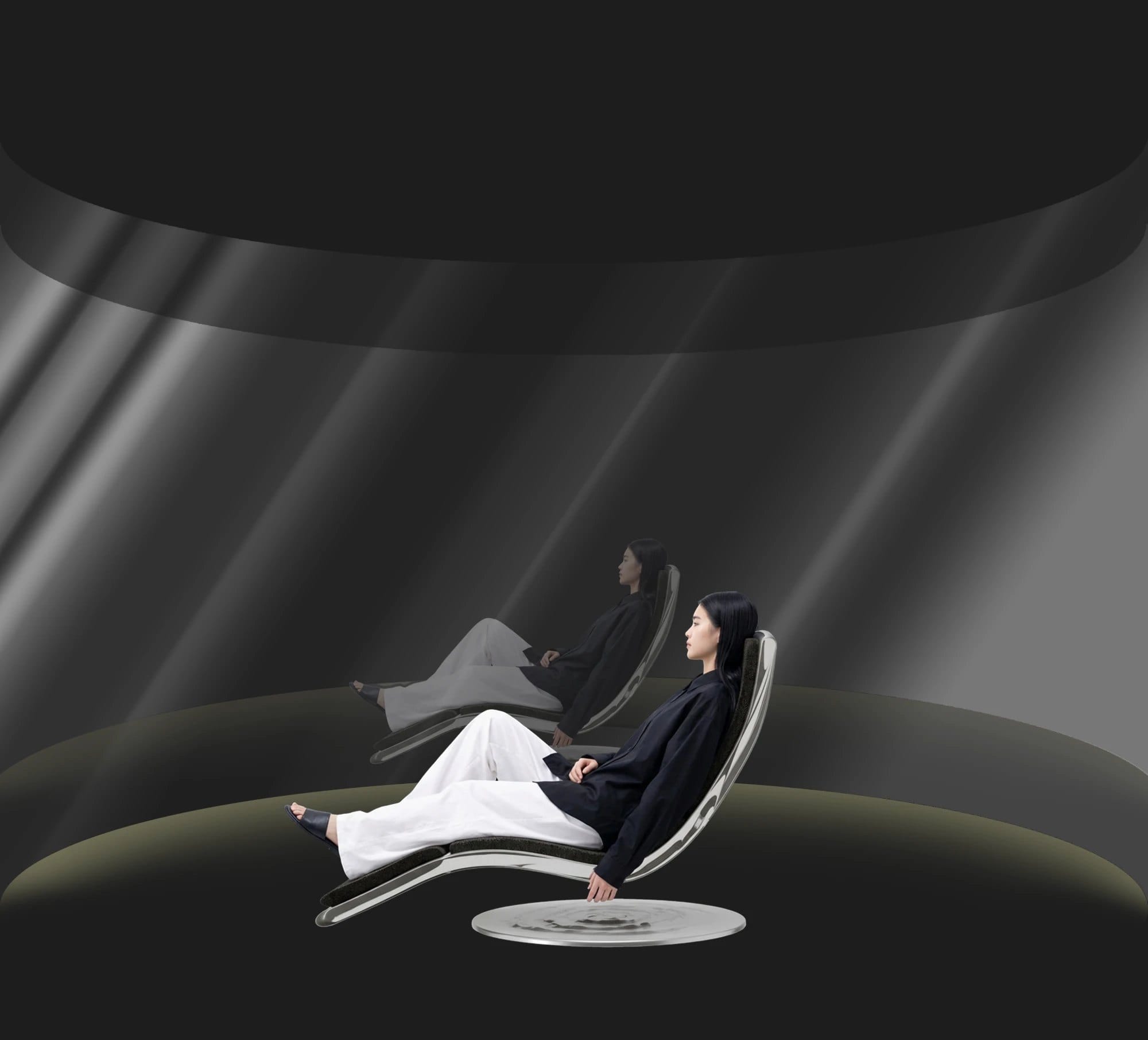 Two people resting on UNOS chairs in a dark, round zero-gravity room with beams of light