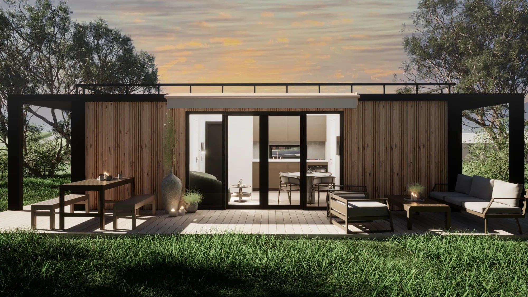 Compact house with vertical timber cladding, a black steel frame and a deck with outdoor dining and lounge at sunset, 3D render